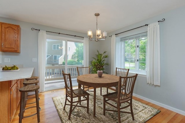 5 Brookfield Dr Unit B, Groton, MA 01450 - dining room featuring healthy amount of natural light, light wood-type flooring, and a chandelier