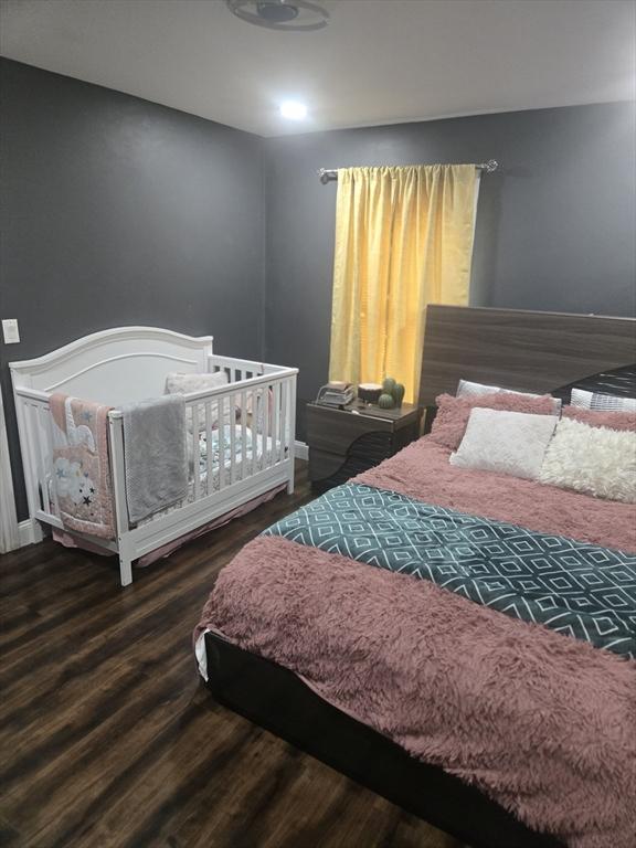 bedroom featuring hardwood / wood-style floors