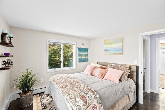 9 Lily Pond Ln, Cohasset, MA 02025 - bedroom with baseboards, a baseboard radiator, and wood finished floors