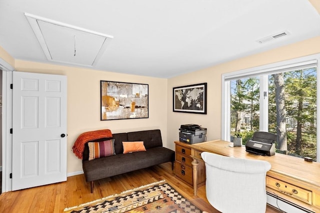 9 Lily Pond Ln, Cohasset, MA 02025 - home office with visible vents, baseboard heating, attic access, and wood finished floors