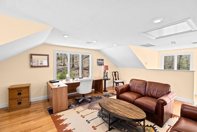 9 Lily Pond Ln, Cohasset, MA 02025 - home office with light wood finished floors, attic access, baseboards, lofted ceiling, and visible vents