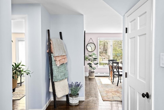 9 Lily Pond Ln, Cohasset, MA 02025 - hall featuring baseboards, wood finished floors, and a baseboard radiator