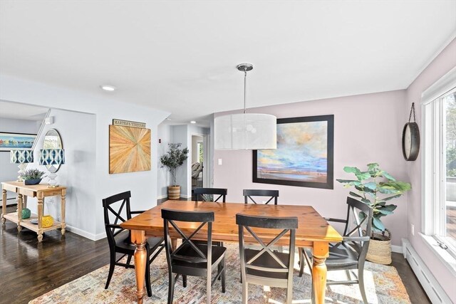 9 Lily Pond Ln, Cohasset, MA 02025 - dining area featuring baseboards, dark wood-style floors, and baseboard heating