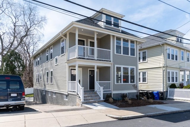 103-105 Neponset Ave, Boston, MA 02131 - view of front of house featuring a balcony and a porch