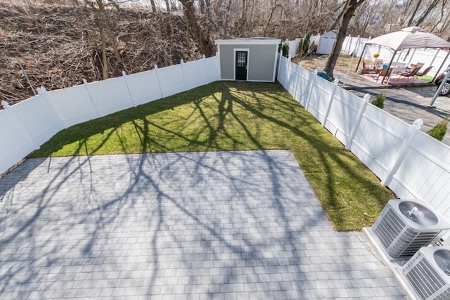 103-105 Neponset Ave, Boston, MA 02131 - fenced backyard with a storage shed, a patio area, and a gazebo