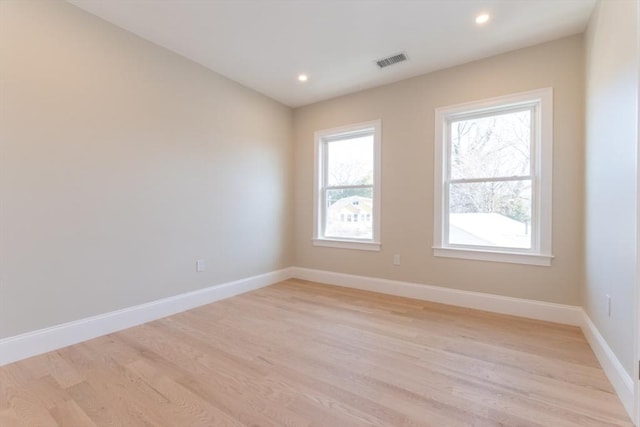 103-105 Neponset Ave, Boston, MA 02131 - empty room featuring light wood-style floors and recessed lighting