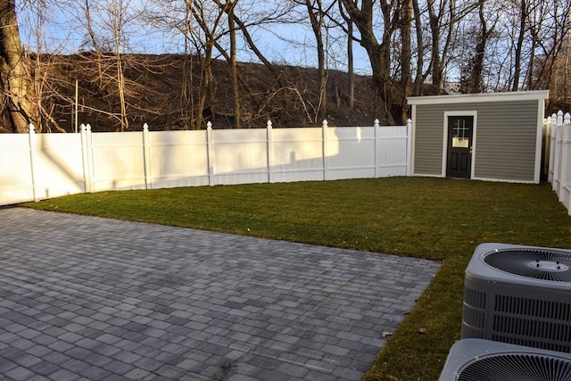 103-105 Neponset Ave, Boston, MA 02131 - fenced backyard featuring an outbuilding and a patio