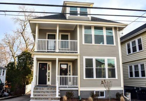 103-105 Neponset Ave, Boston, MA 02131 - view of front of home with a balcony and a porch