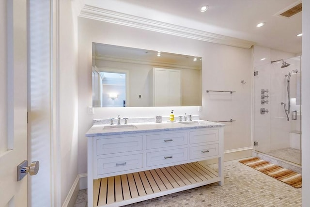 bathroom featuring tile patterned flooring, vanity, an enclosed shower, and ornamental molding