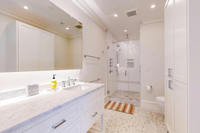 bathroom with tile patterned floors, vanity, ornamental molding, and walk in shower