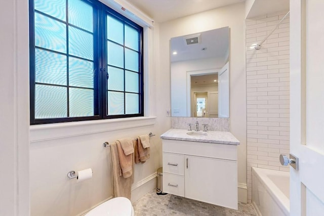 full bathroom with shower / bathing tub combination, vanity, and toilet