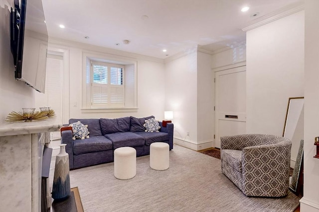 living room featuring crown molding