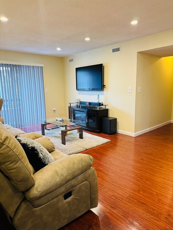 living room with hardwood / wood-style flooring