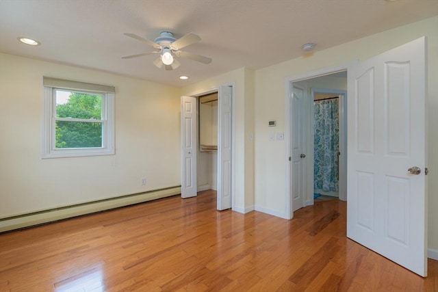 48 Rosemont St Unit 48, Haverhill, MA 01830 - unfurnished bedroom with light wood-style floors, a baseboard heating unit, ceiling fan, and recessed lighting