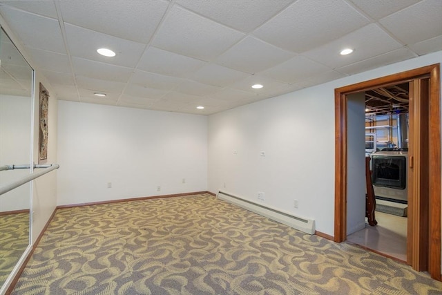 48 Rosemont St Unit 48, Haverhill, MA 01830 - carpeted spare room with baseboard heating, washer / clothes dryer, a drop ceiling, and recessed lighting