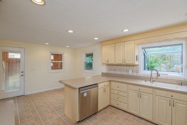 48 Rosemont St Unit 48, Haverhill, MA 01830 - kitchen with stainless steel dishwasher, a peninsula, recessed lighting, light brown cabinetry, and light countertops