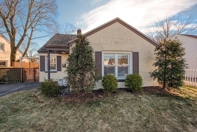 exterior space with a front lawn