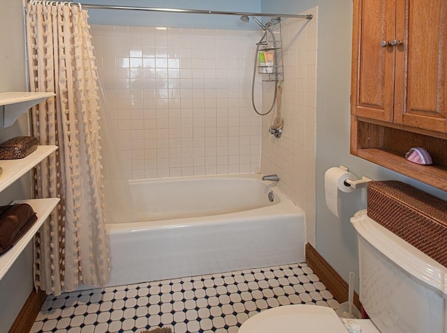 bathroom with tile patterned floors, radiator, shower / bath combo with shower curtain, and toilet