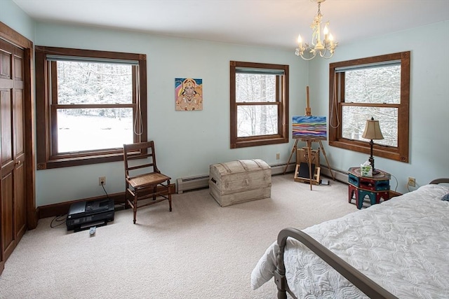 bedroom with baseboard heating, a closet, carpet floors, and a notable chandelier