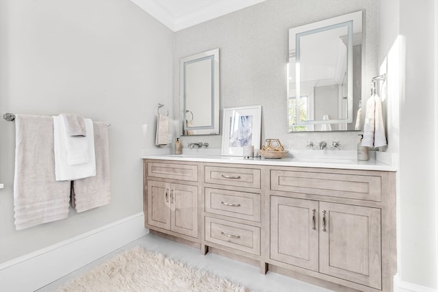 bathroom featuring crown molding, tile patterned flooring, and vanity