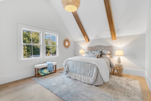 bedroom featuring beamed ceiling, light hardwood / wood-style flooring, and high vaulted ceiling