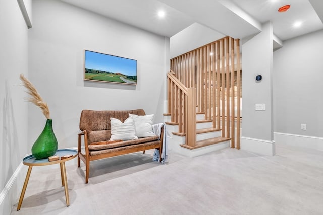 sitting room with light carpet