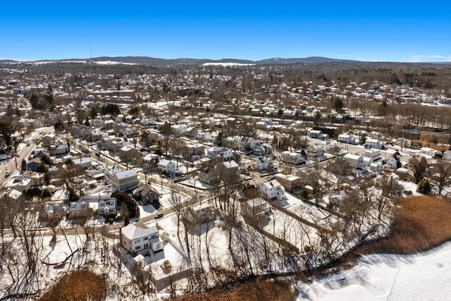 drone / aerial view with a residential view and a mountain view