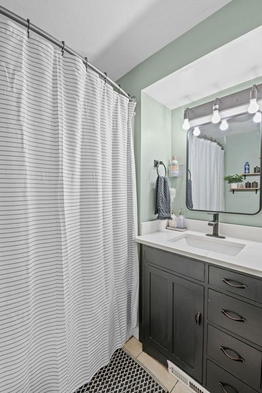 bathroom featuring vanity and tile patterned floors