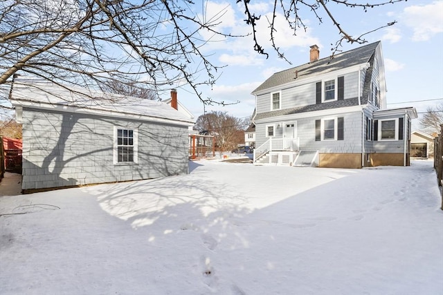 view of snow covered house