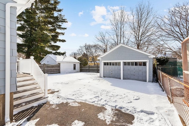 view of snow covered garage