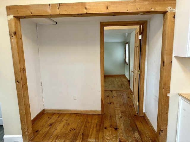 hallway featuring hardwood / wood-style floors