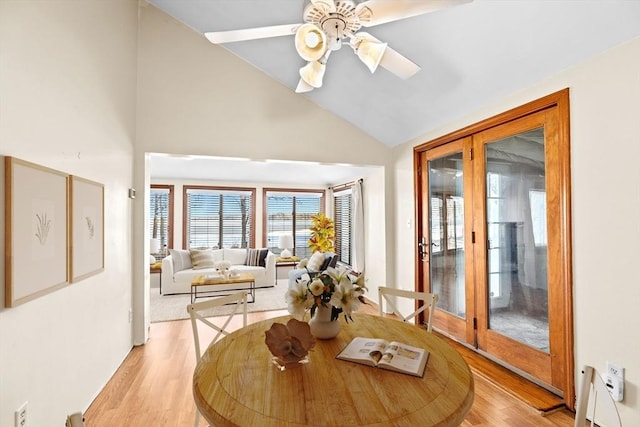 4 Morrison Way, Lakeville, MA 02347 - dining room with french doors, light wood-style floors, a ceiling fan, and high vaulted ceiling