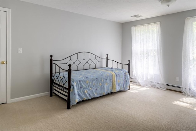 177 S St, Upton, MA 01568 - carpeted bedroom featuring baseboards and baseboard heating