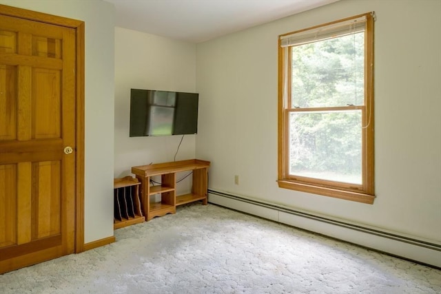 177 S St, Upton, MA 01568 - bedroom with a baseboard radiator and light carpet