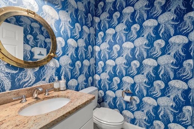 36 Village Way, Duxbury, MA 02332 - bathroom with wallpapered walls, toilet, and vanity