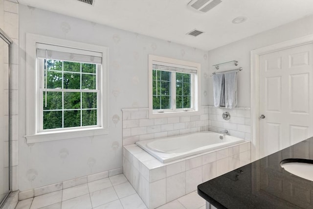 36 Village Way, Duxbury, MA 02332 - full bathroom featuring healthy amount of natural light, tile patterned floors, and a garden tub