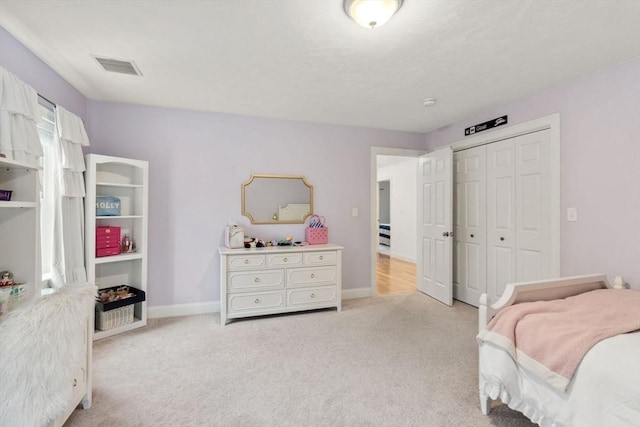36 Village Way, Duxbury, MA 02332 - bedroom with light colored carpet, baseboards, and a closet