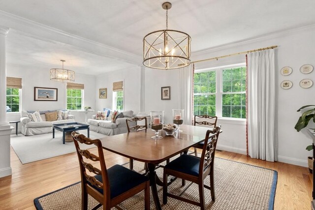 36 Village Way, Duxbury, MA 02332 - dining room featuring a chandelier, light wood finished floors, ornamental molding, and baseboards