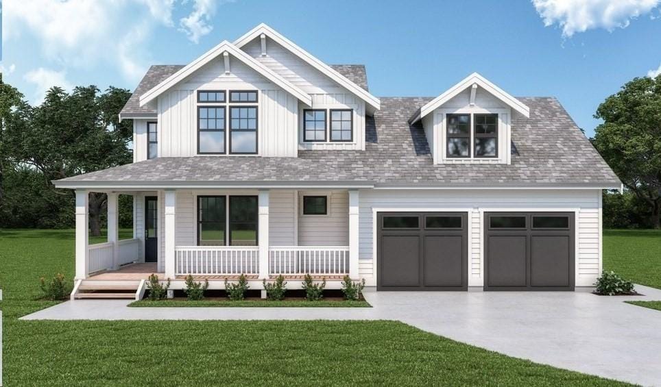 182 Mountain Rd, Wilbraham, MA 01095 - view of front facade with a porch, driveway, a front lawn, and an attached garage
