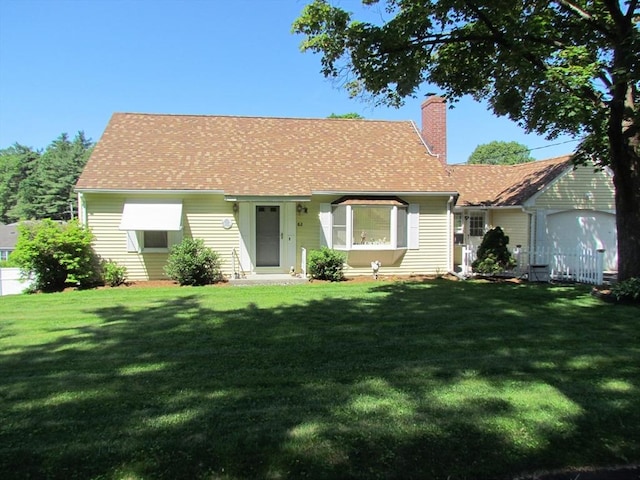 82 Laroche St, Ludlow, MA 01056 - view of front of house with a chimney