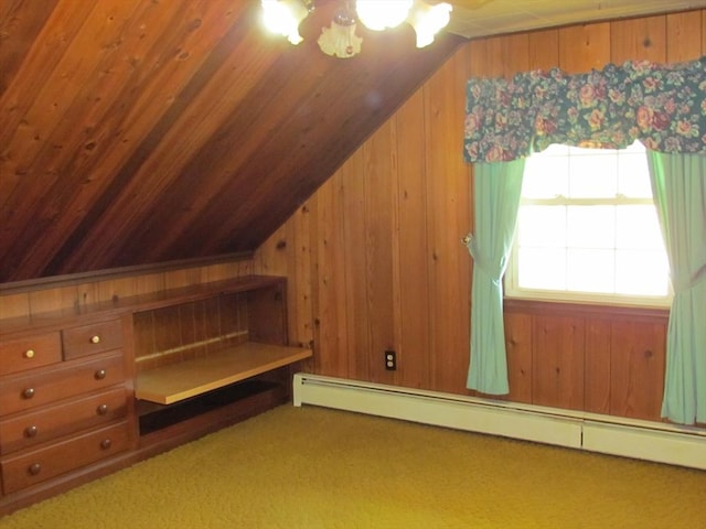 82 Laroche St, Ludlow, MA 01056 - additional living space featuring a baseboard heating unit, vaulted ceiling, wooden walls, and carpet flooring
