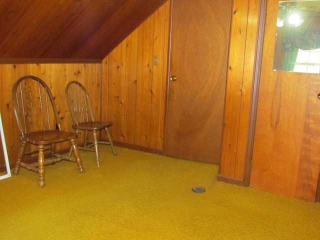 82 Laroche St, Ludlow, MA 01056 - sitting room featuring vaulted ceiling, wood walls, carpet floors, and wooden ceiling