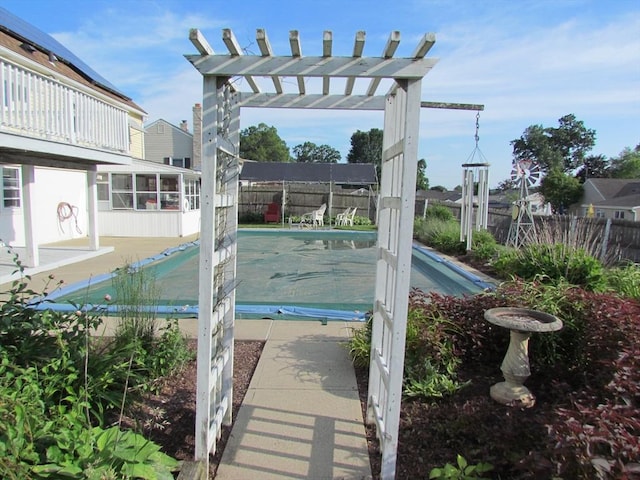 82 Laroche St, Ludlow, MA 01056 - view of swimming pool featuring a pergola and a fenced backyard