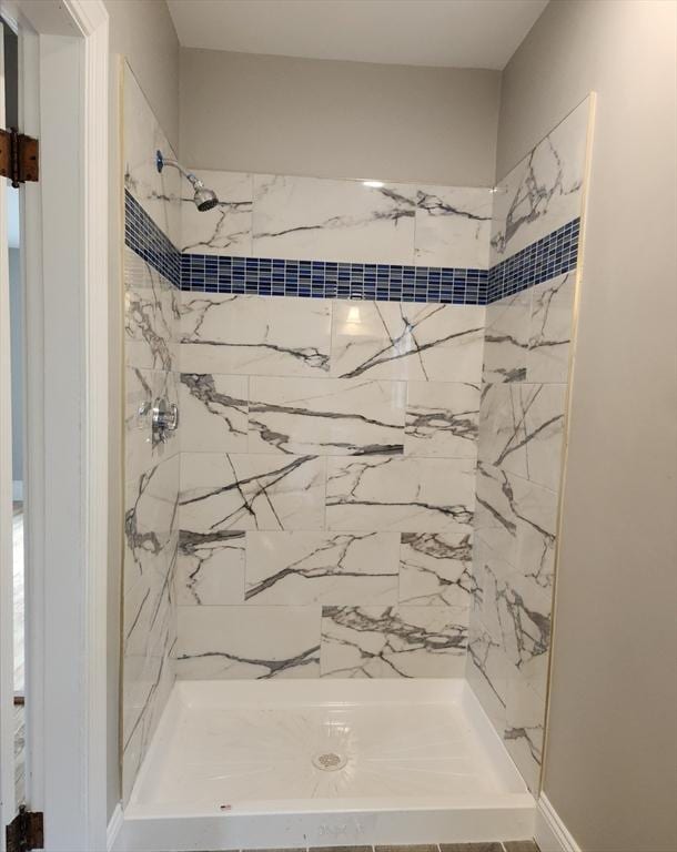 9 Varney St, Worcester, MA 01605 - full bath with a marble finish shower