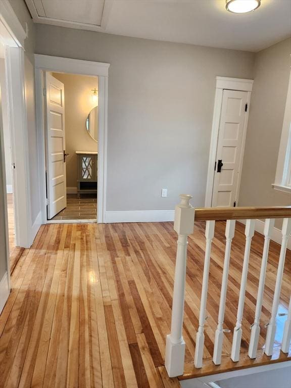 9 Varney St, Worcester, MA 01605 - corridor featuring light wood-type flooring and an upstairs landing