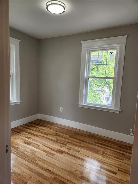 9 Varney St, Worcester, MA 01605 - empty room with light wood-type flooring
