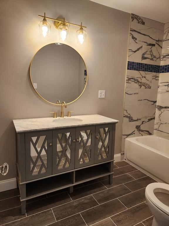 9 Varney St, Worcester, MA 01605 - full bath featuring vanity and tub / shower combination