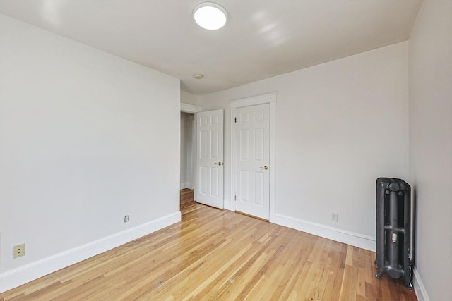 empty room with light wood-type flooring