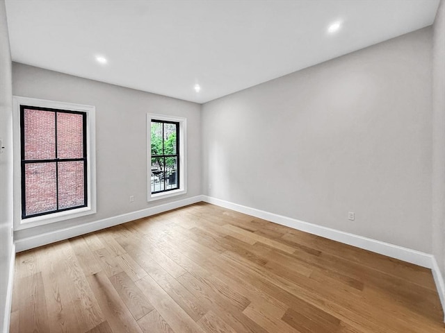 667 Tremont St Unit 2, Boston, MA 02118 - spare room featuring baseboards, light wood finished floors, and recessed lighting