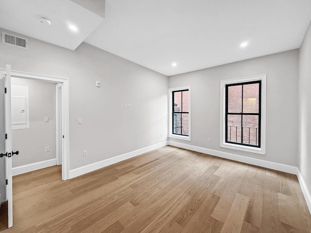 667 Tremont St Unit 2, Boston, MA 02118 - empty room featuring baseboards, light wood-type flooring, a smoke detector, and recessed lighting